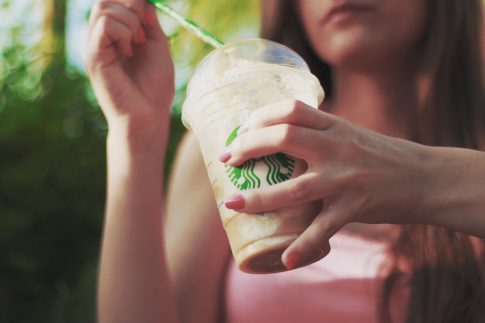 Vanilla Iced coffee Starbucks, girl holding a cup of Starbucks coffee